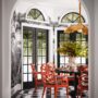 RuPaul's breakfast nook featuring a 1970s gold fixture belonging to Yves Saint Laurent