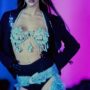 Model wears chaps and bra on the Thierry Mugler runway in 1992