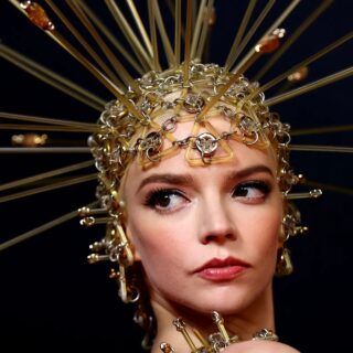 Anya Taylor Joy photographed wearing vintage headpiece from Paco Rabanne